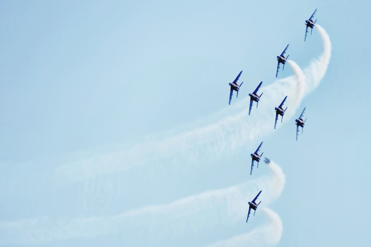 flying, sky, cloud - sky, air vehicle, transportation, low angle view, airplane, mode of transportation, airshow, mid-air, teamwork, motion, cooperation, on the move, fighter plane, plane, vapor trail, speed, no people, military airplane, order, outdoors, aerobatics