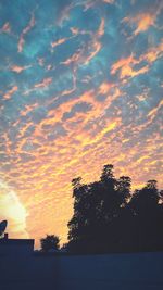 Scenic view of cloudy sky at sunset