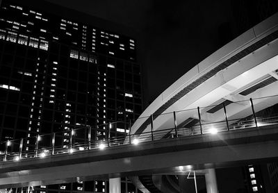 Low angle view of modern building at night