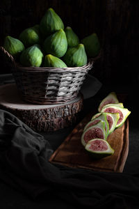 High angle view of fruits in basket on table