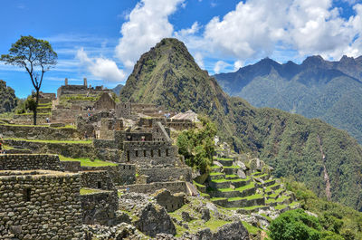 View of old ruins against cloudy sky