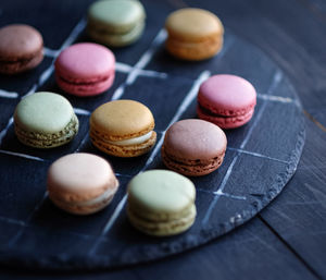 High angle view of macaroons on table