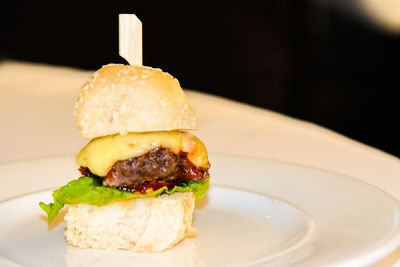 Close-up of burger in plate on table