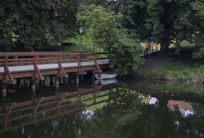 Scenic view of river by trees
