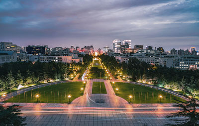 Illuminated buildings in city at night