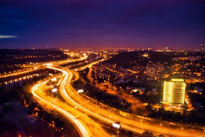 High angle view of illuminated cityscape at night