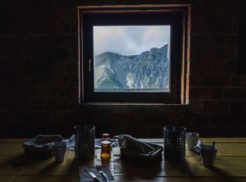 Snow on table by window