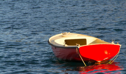 High angle view of red boat in sea