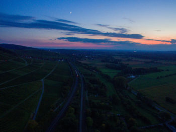 Scenic view of landscape against sky during sunset