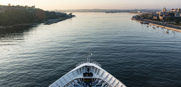 Front end of cruise ship  entering havana cuba after leaving america for vacation and education.