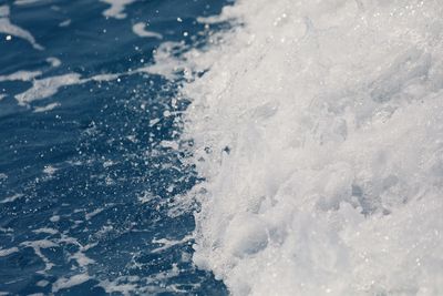 High angle view of snow on sea