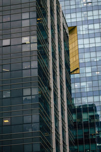 Low angle view of modern glass building