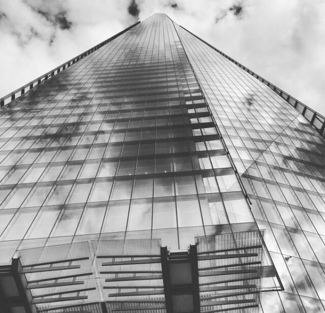 LOW ANGLE VIEW OF SKYSCRAPERS AGAINST SKY