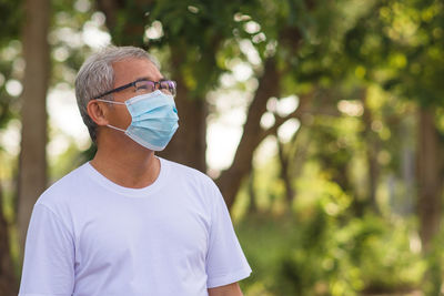 Portrait of man wearing mask outdoors