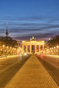 The famous brandenburger tor in berlin with the television tower at twilight