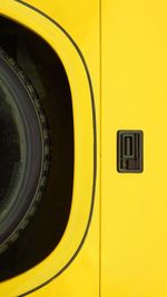 Close-up of yellow camera