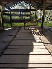 Shadow of a cat on wooden wall