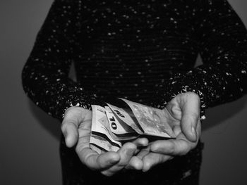 Close-up of woman holding hands