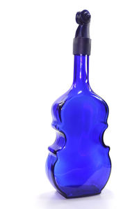 Close-up of blue object over white background
