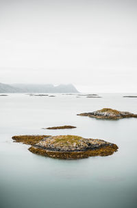 Scenic view of norway's rocky islands. ideal for nature, travel, and coastal projects. 