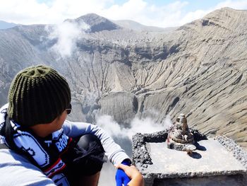 Man on snowcapped mountains during winter
