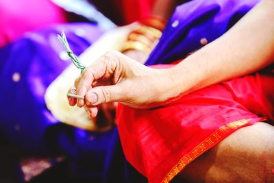 Close-up of woman holding hands