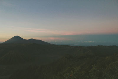 Scenic view of landscape against sky during sunset