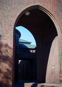 View of buildings seen through arch