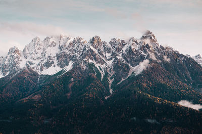 Scenic view of mountains against sky during winter