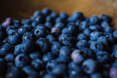 Close up of blueberries in a wooden bowl