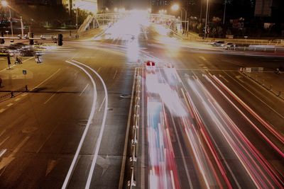 High angle view of light trails on road