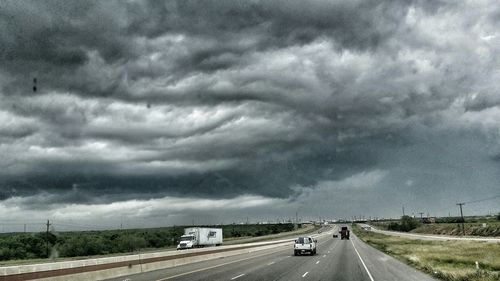 Road against cloudy sky