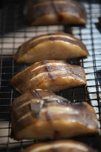 Close-up of fish grilled on barbecue