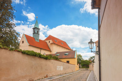 Panoramic view of buildings and houses against sky