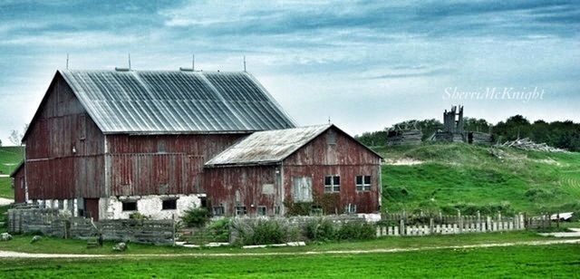 building exterior, architecture, grass, built structure, field, sky, house, grassy, green color, barn, rural scene, cloud - sky, landscape, tree, cloud, residential structure, day, nature, outdoors, cloudy