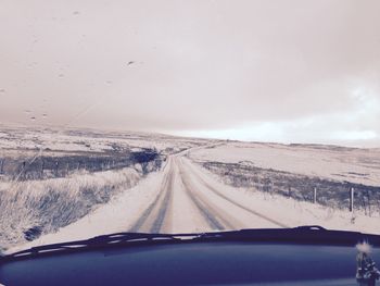 Country road passing through landscape