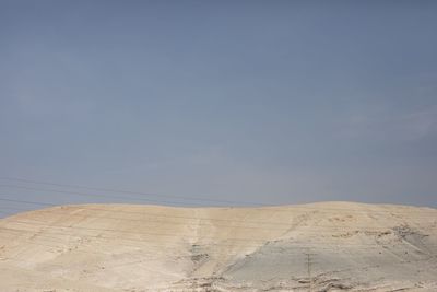 Low angle view of desert against sky