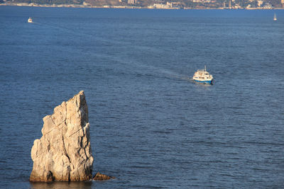 High angle view of rock in sea
