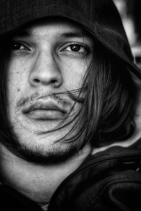 Close-up of thoughtful young man looking away