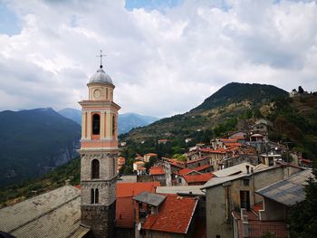 View of townscape by building against sky