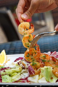 Close-up of person preparing food