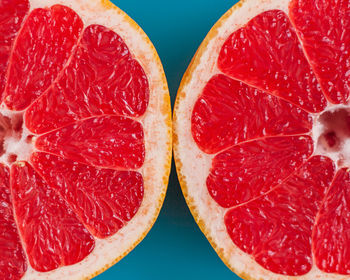 Close-up of grapefruit on a blue background