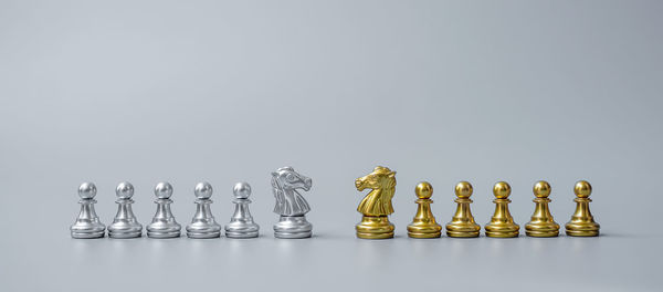 Row of chess board against white background