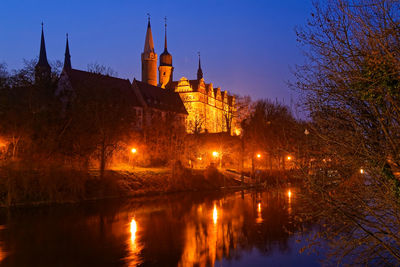 Illuminated buildings at the waterfront