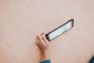 Close-up of person using mobile phone