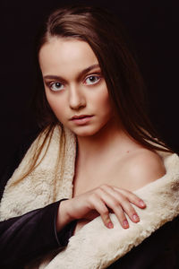 Close-up portrait of young woman