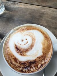 High angle view of cappuccino on table