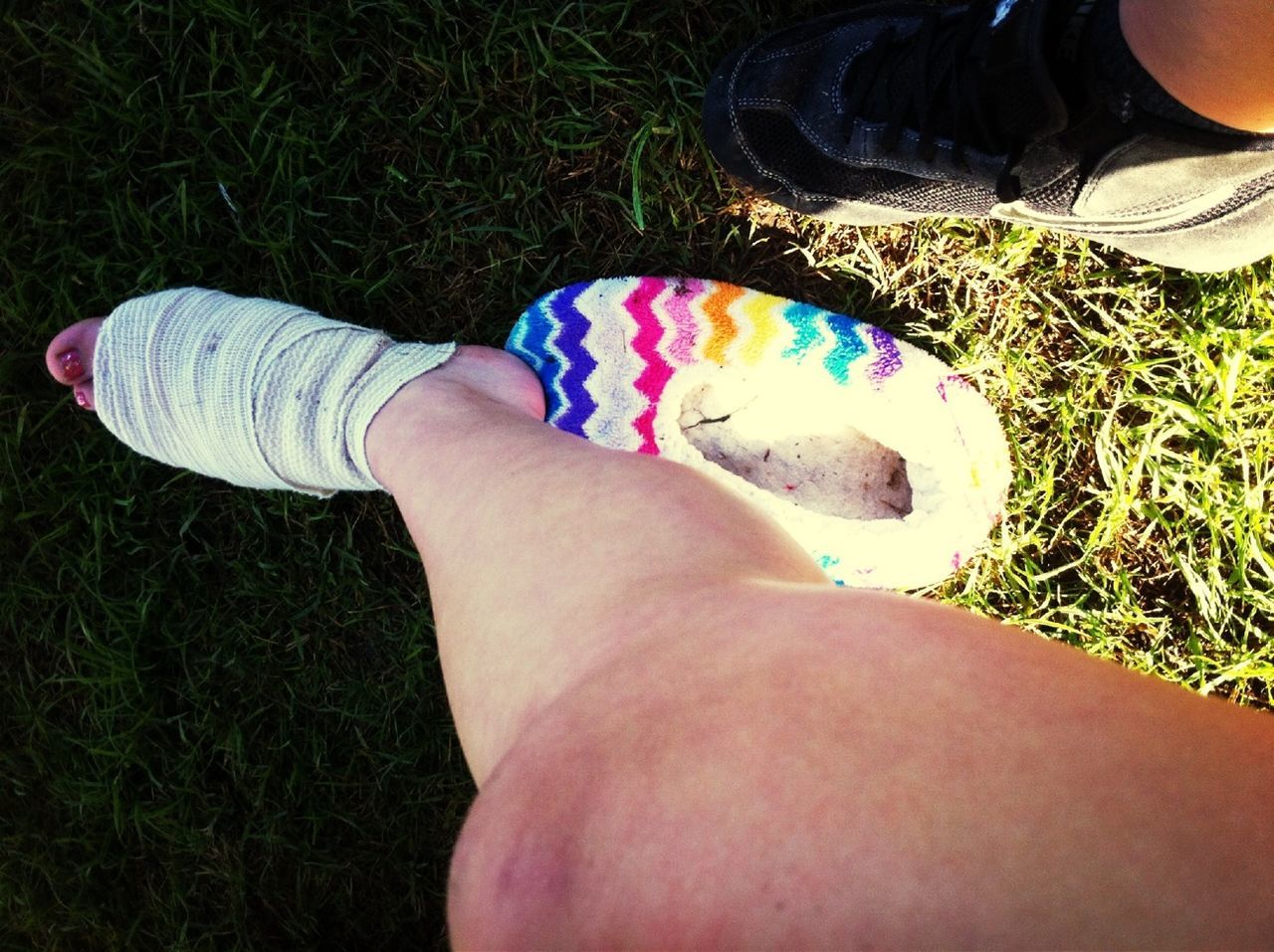 grass, low section, person, lifestyles, personal perspective, leisure activity, field, high angle view, part of, grassy, human foot, barefoot, relaxation, green color, holding