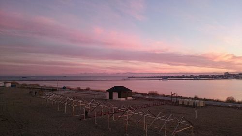 Scenic view of beach at sunset