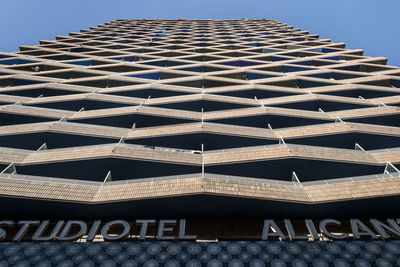 Low angle view of building against blue sky